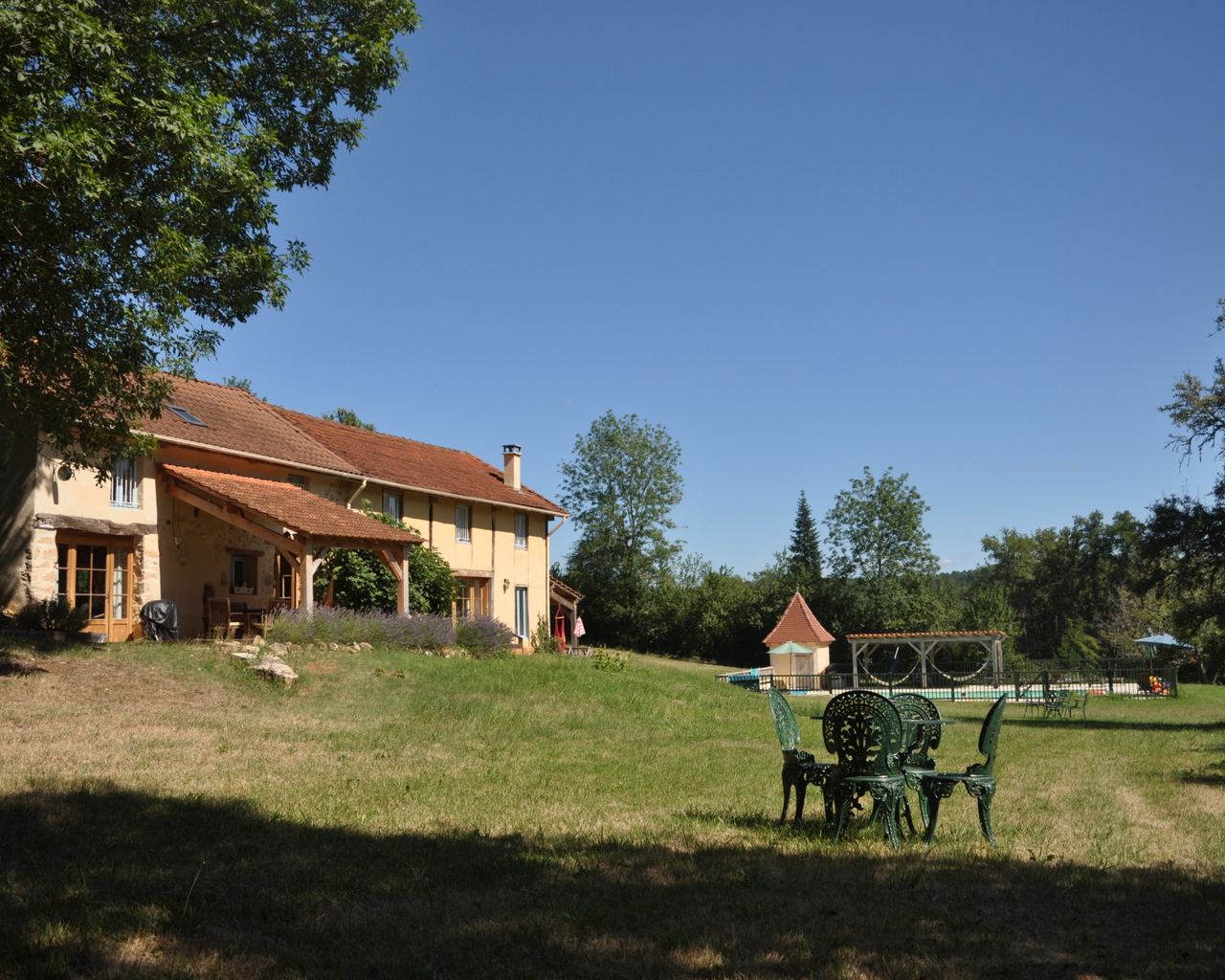 Hope Cottage and Rose Barn looking towards the pool at Sol du Mazel